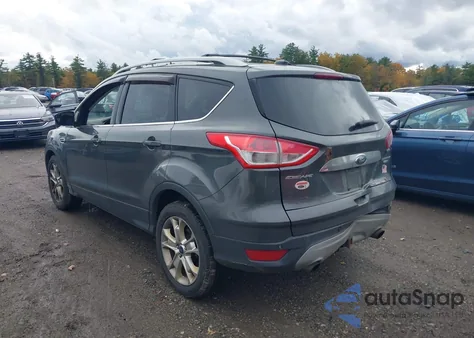 2016 Ford Escape Titanium z USA, uszkodzony, nr VIN 1FMCU9J95GUB49828